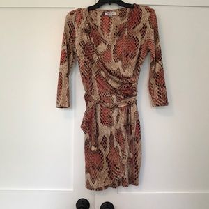 Jennifer Lopez snake skin wrap dress